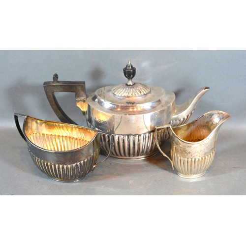 157 - An Edwardian Silver Three Piece Tea Service comprising teapot, cream jug and two handled sucrier, al... 