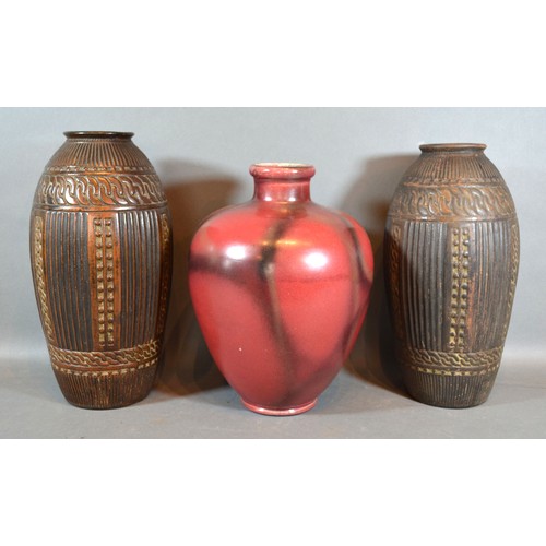 13 - A Pair of Bretby Pottery Vases of oviform with ribbed decoration, 28 cms tall, together with a Bretb... 