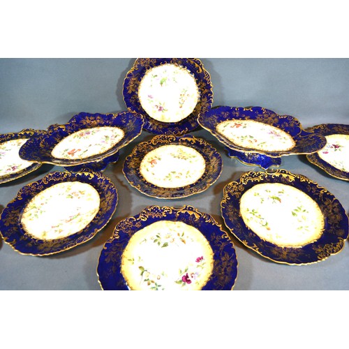 25 - A Hammersley Dessert Service comprising a pair of comports and nine plates all hand painted with flo... 