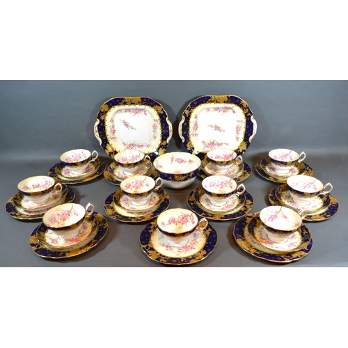 26 - A Hammersley Porcelain Tea Service comprising eleven cups, ten saucers, eleven plates, two serving p... 