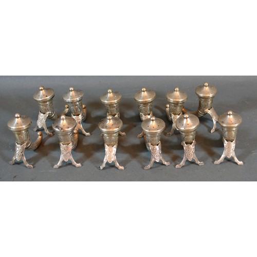 167 - A Set of Twelve Continental 800 Mark Silver Peppers in the form of Cornucopia 6 cms tall, 9 ozs.