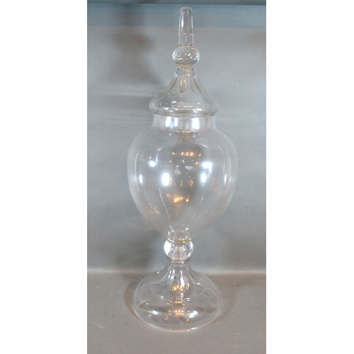 48 - A Large Glass Covered Vase of Oviform with circular pedestal base, 77 cms tall