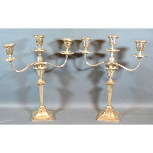 171 - A Pair of Silver Plated Three Branch Candelabrum in the Adams Style, 35 cms tall