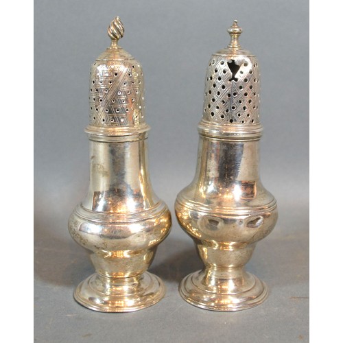 172 - A George III Silver Pepper, London 1770, 13 cms tall together with another similar Georgian silver p... 