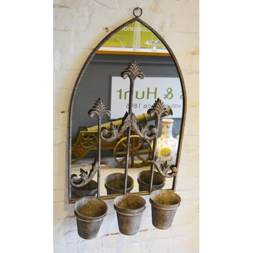 530 - A Weathered Metal Mirror with shaped form above three small planters 82cm by 45cm