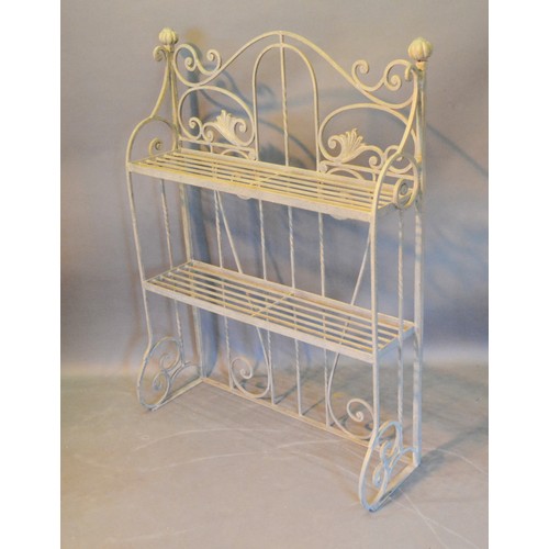 532 - A Wrought Iron Garden Plant Stand of shaped scroll form 93cm by 22cm and 122cm tall