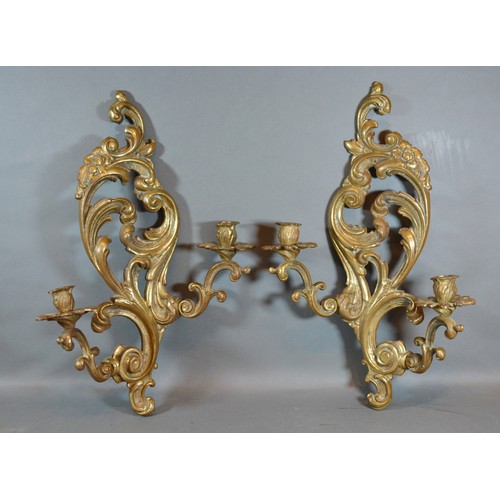 382 - A Pair of French Patinated Bronze Wall Sconces of shaped scroll form 49cm long