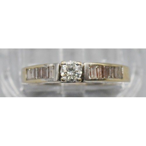 251 - An 18ct White Gold Solitaire Diamond Ring, with diamond shoulders, approximately 0.10 ct. 3.2 grams,... 