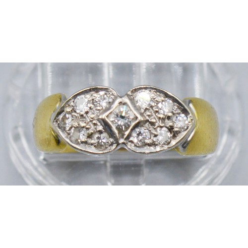 252 - An 18ct Gold Diamond Cluster Ring Of Double Heart Form, 5 grams, ring size M