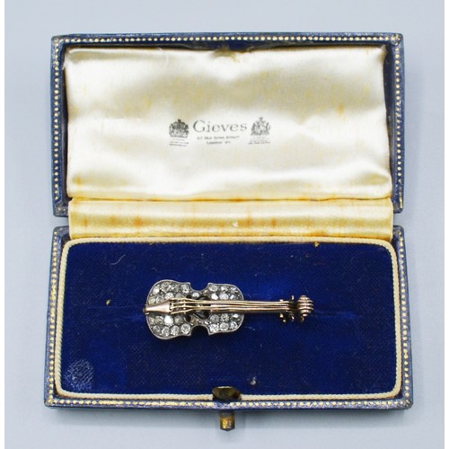 265 - A yellow Metal Brooch In The Form Of A Violin, set with many diamonds, 5.5 grams, 3.5cms long