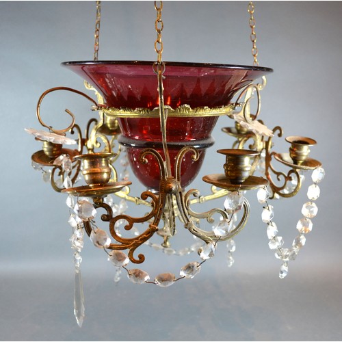 384 - A Cranberry Glass Chandelier with Facet Cut Glass Drops and Candle Sconces, 40 cms diameter