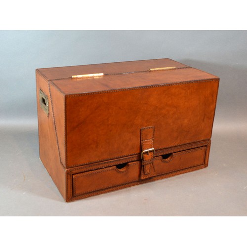 385 - A Leather Stationery Box, the hinged front enclosing a fitted interior with brass sunken side handle... 