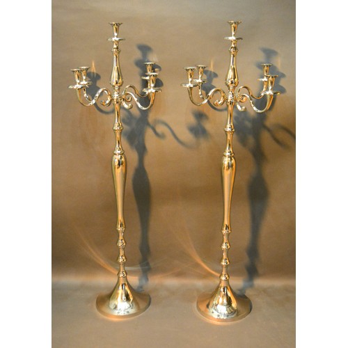 387 - A Pair of Floor Standing Chromium Five Branch Candelabrum with circular bases, 149 cms tall