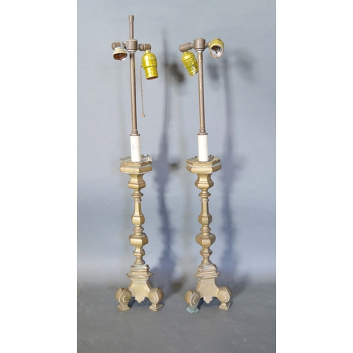 389 - A Pair of 18th Century Style Brass Table Lamps of shaped octagonal form with triform scroll feet, 74... 