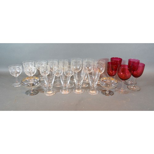 77 - Five Cranberry Glass Pedestal Glasses together with a small set of glasses, four tapered glasses and... 