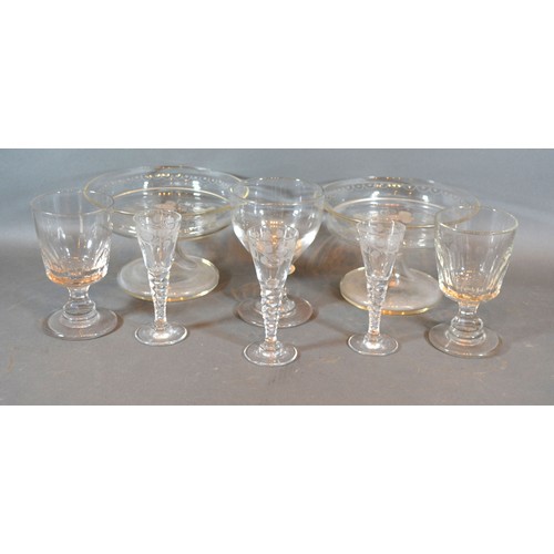 78 - A Pair of Edwardian Glass Comports together with a set of three 19th Century engraved cordial glasse... 