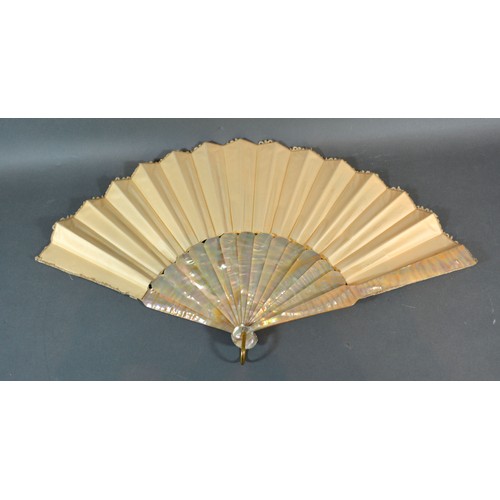 282 - A Lace Fan backed with lilac satin with mother-of-pearl sticks and guards with gilded monogram 27cm ... 