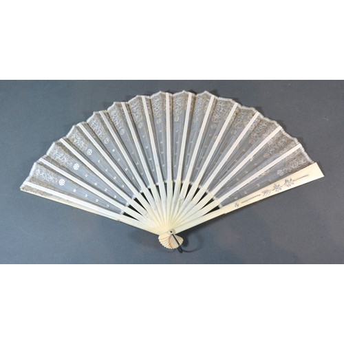 293 - An Ivory and Gauze Leaf Fan with carved ivory sticks and guards and with sequin decorated gauze leaf... 