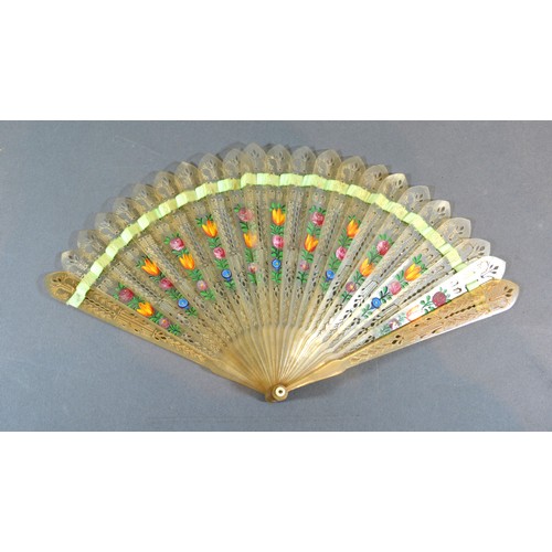 296 - A Horn Brise Fan with Pierced and Carved Sticks hand painted with roses and with carved and pierced ... 