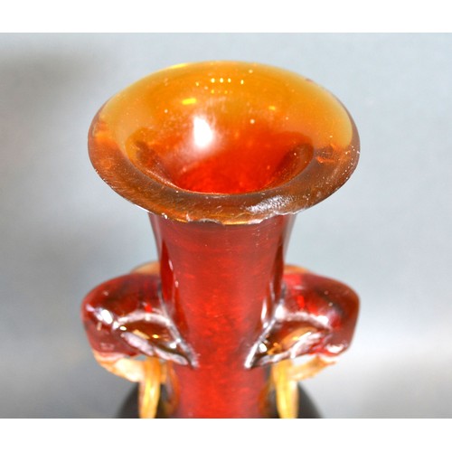 398 - An Early 20th Century Chinese Amber Resin Vase with hardwood stand, 24 cms tall