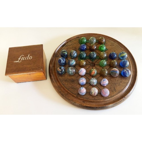 408 - A Collection of Victorian Marbles complete with Solitaire board and an early Ludo box