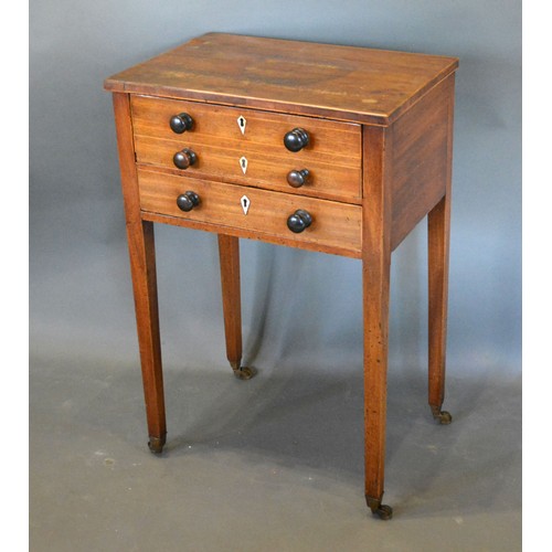 541 - A Regency Mahogany Work Table, the line inlaid top above two drawers simulated as three drawers with... 