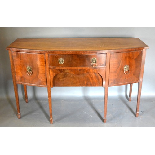 548 - A Early 20th Century Mahogany Bow-Fronted Sideboard with two central drawers flanked by cupboard doo... 