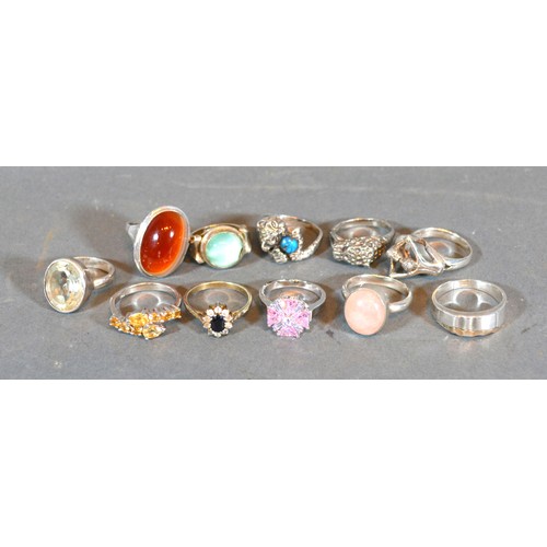 193 - A Collection of Eleven Silver Dress Rings set various stones