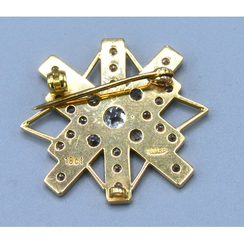 198 - An 18ct. Gold Diamond Set Brooch of Abstract Star Form, the central diamond approximately 0.40 ct. s... 