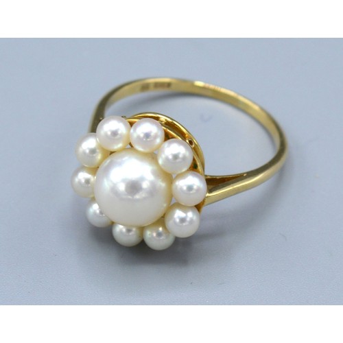 202 - A 14 ct. Gold Pearl Cluster Ring by Mikimoto, 3.2 gms. ring size Q