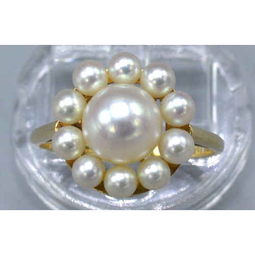 202 - A 14 ct. Gold Pearl Cluster Ring by Mikimoto, 3.2 gms. ring size Q