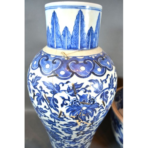 57 - A Late 18th or Early 19th Century Chinese Porcelain Covered Vase decorated in underglaze blue togeth... 