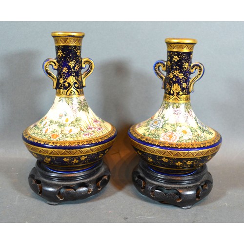 59 - A Pair of Late 19th or Early 20th Century Satsuma Earthenware Two Handled Bottleneck Vases each deco... 