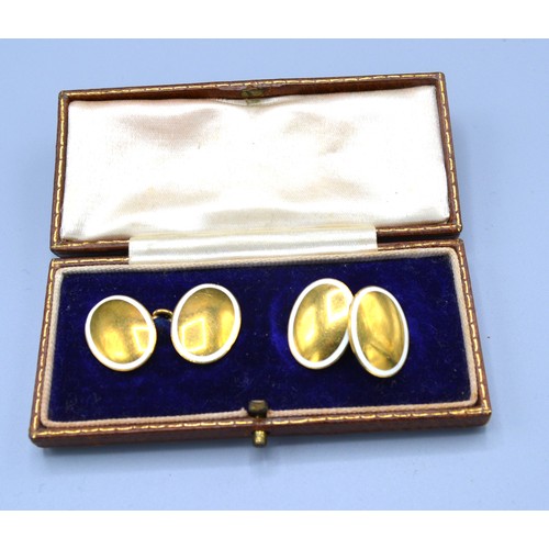 222 - A Pair of 18ct. Gold and Enamel Decorated Cufflinks within original fitted box, 9.8 gms.