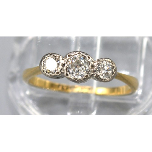 227 - An 18ct Gold and Platinum Three Stone Diamond Ring