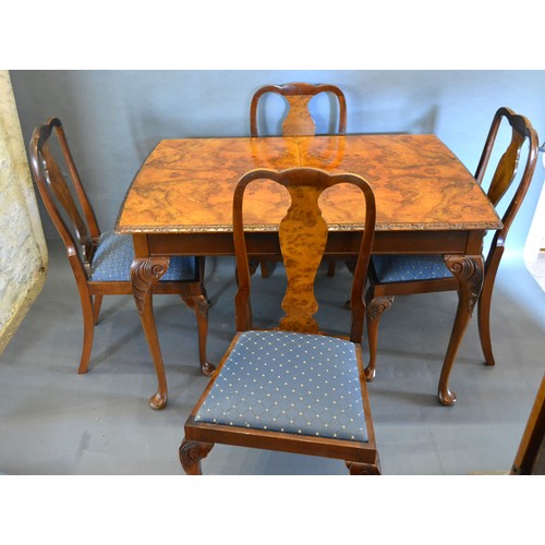 377 - A Burr Walnut Queen Anne Style Dining Room Suite comprising an extending dining table with single ex... 