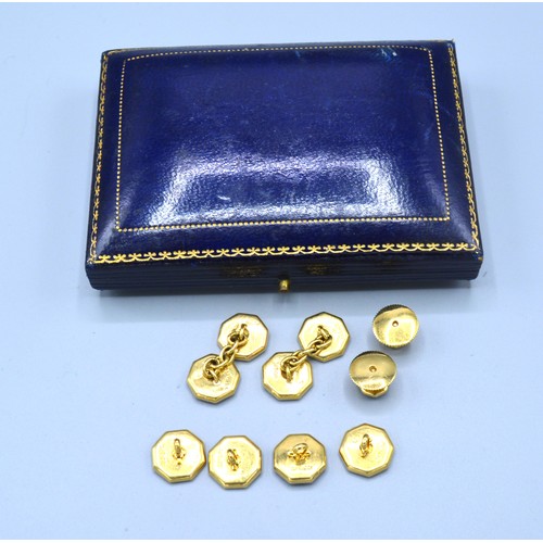 144 - A Gentleman's Dress Set in 18ct Gold and Platinum set with mother of pearl and pearls comprising a p... 