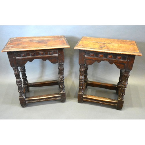 392 - A Pair of Early Oak Joined Stools the moulded tops above a carved frieze raised upon carved legs wit... 