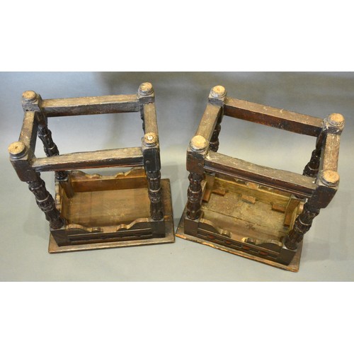 392 - A Pair of Early Oak Joined Stools the moulded tops above a carved frieze raised upon carved legs wit... 