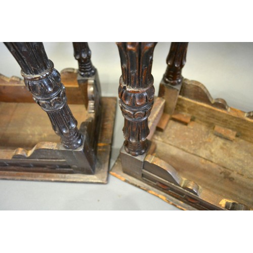 392 - A Pair of Early Oak Joined Stools the moulded tops above a carved frieze raised upon carved legs wit... 