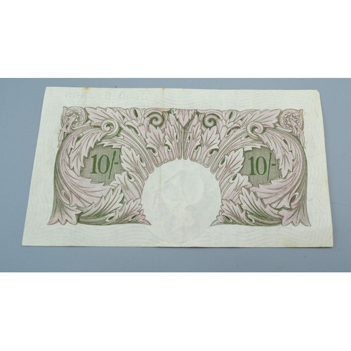 271 - A Bank Of England Ten Shillings Note numbered J56D 843865