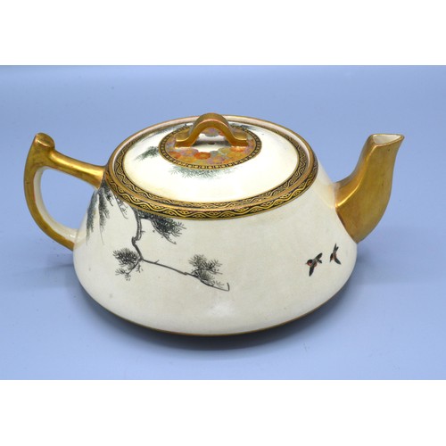 4 - A 19th Century Japanese Satsuma Teapot with hand painted and gilded decoration depicting a bird of p... 