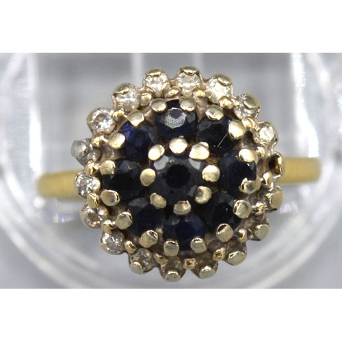 156 - An 18ct Gold Sapphire and Diamond Cluster Ring with a central cluster of sapphires surrounded by dia... 