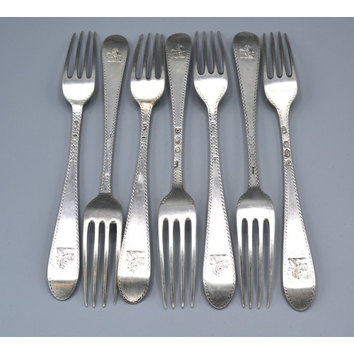 162 - A Set of Seven George III Irish Silver Table Forks with engraved decoration, Dublin 1876, maker's ma... 