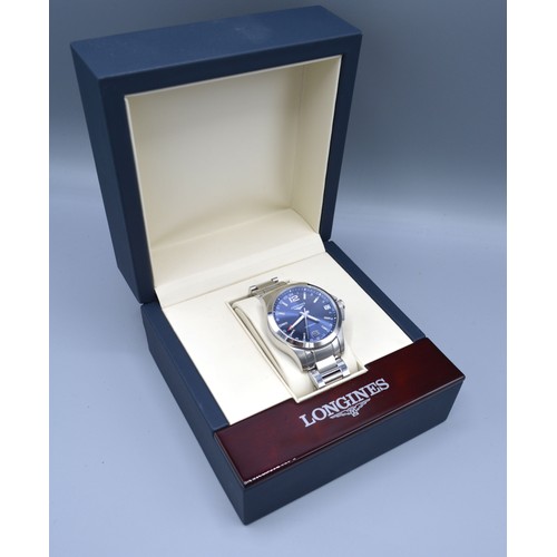 208 - A Longines Conquest Stainless Steel Cased Gentleman's Wrist Watch, the blue dial with date aperture ... 