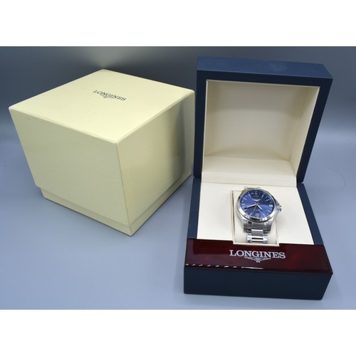 208 - A Longines Conquest Stainless Steel Cased Gentleman's Wrist Watch, the blue dial with date aperture ... 