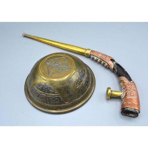 325 - A Persian Copper and Brass Pipe set coral and turquoise together with a similar Persian bowl