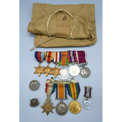 329 - A First World War and Second World War Father and Son Medal Group comprising a First World War group... 