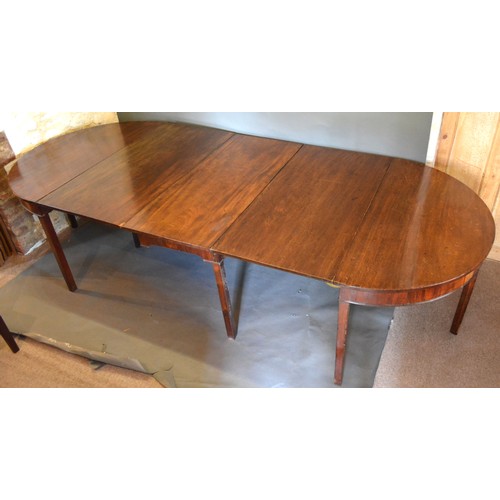 474 - A 19th Century Mahogany Extending Dining Table with centre drop flap table and with a pair of demi-l... 