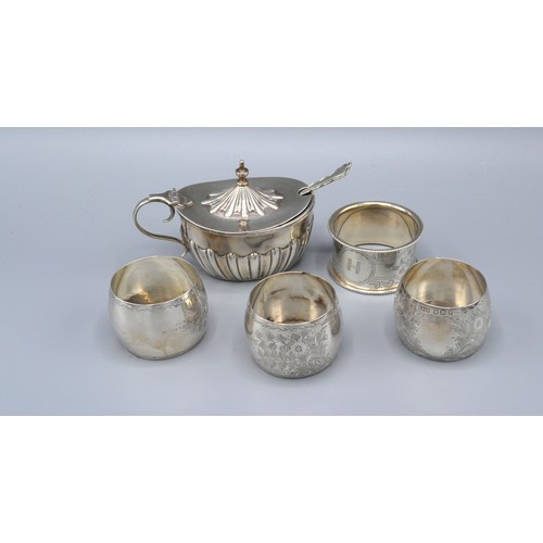 80 - A Chester silver mustard with spoon together with a set of three Sheffield silver napkin rings and a... 